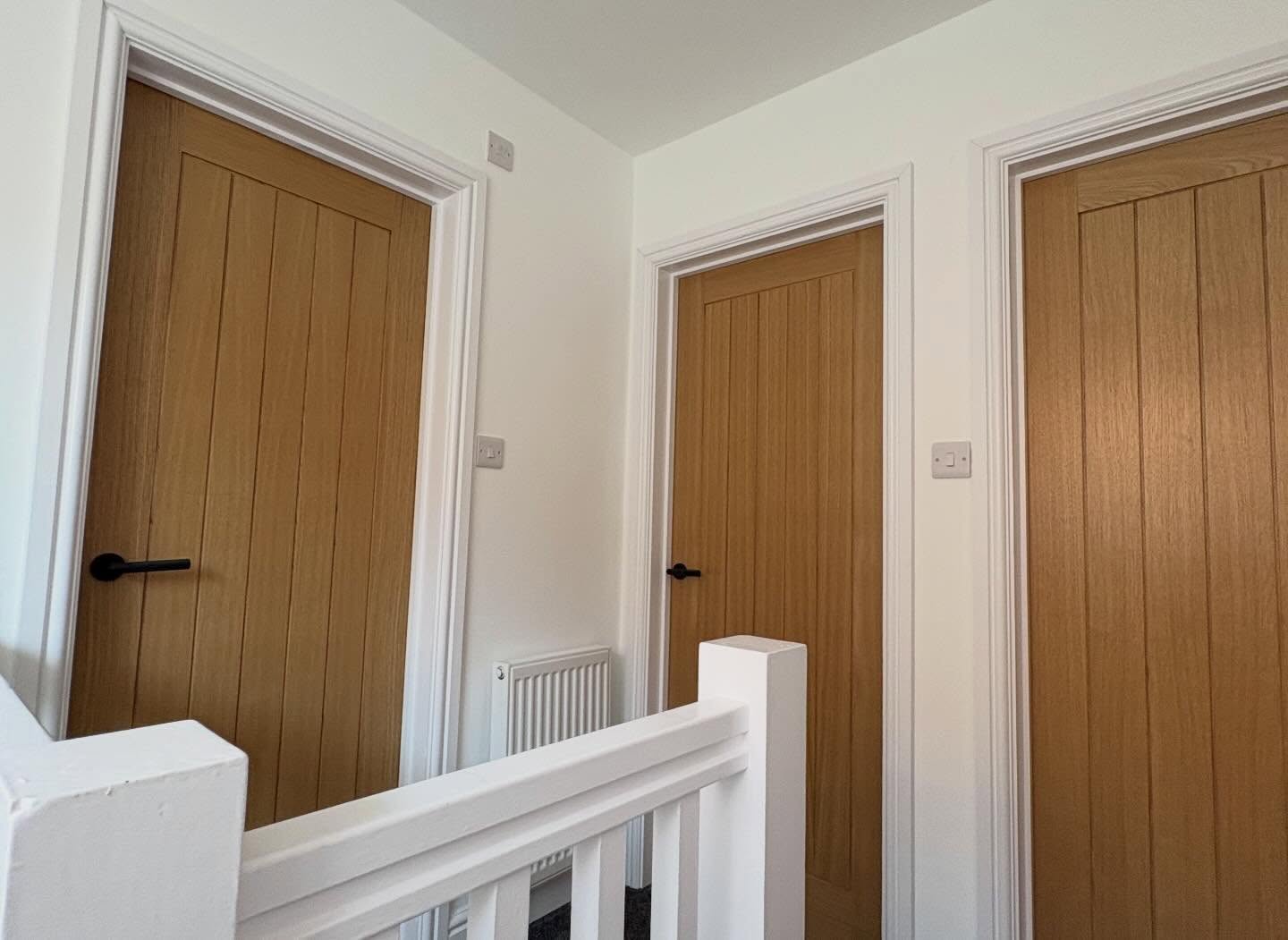 Oak internal doors and painted landing